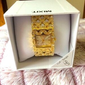 Mixit Women’s Gold Tone Bangle Watch